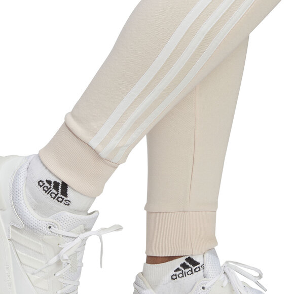 Spodnie damskie adidas Essentials 3-Stripes French Terry Cuffed kremowe IC9924