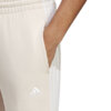 Spodnie damskie adidas Essentials 3-Stripes French Terry Cuffed kremowe IC9924