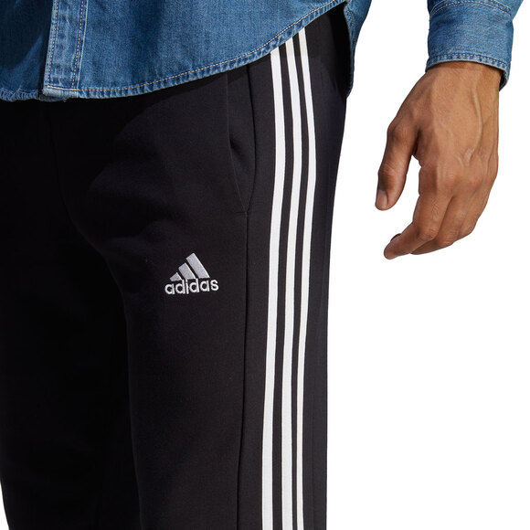 Spodnie męskie adidas Essentials French Terry Tapered Cuff 3-Stripes czarne HA4337