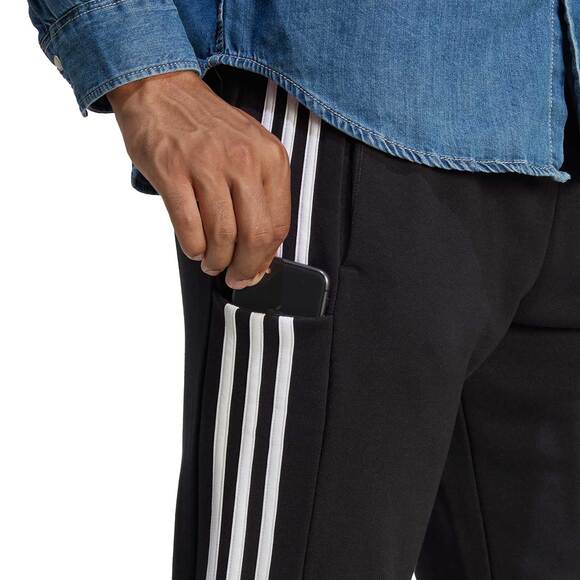 Spodnie męskie adidas Essentials French Terry Tapered Cuff 3-Stripes czarne HA4337