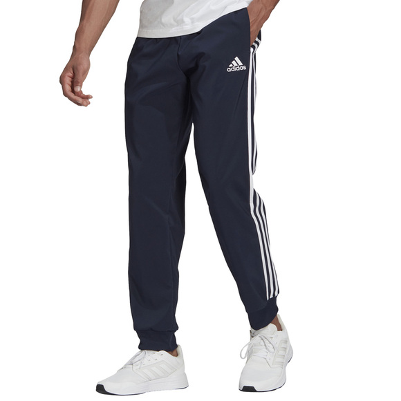 Spodnie męskie adidas Essentials Tapered Cuff 3 Stripes Pants granatowe GK8981 