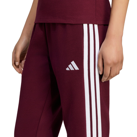 Spodnie damskie adidas Essentials 3-Stripes Fleece Slim bordowe KF8321