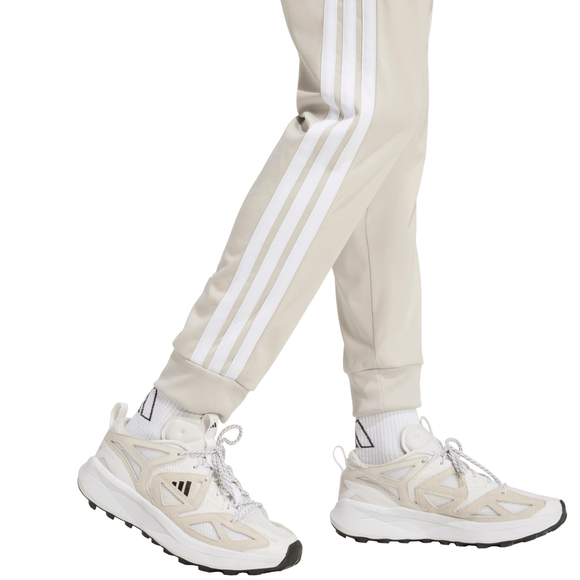 Spodnie męskie adidas 3-Stripes Tricot Regular Tapered beżowe JY7721