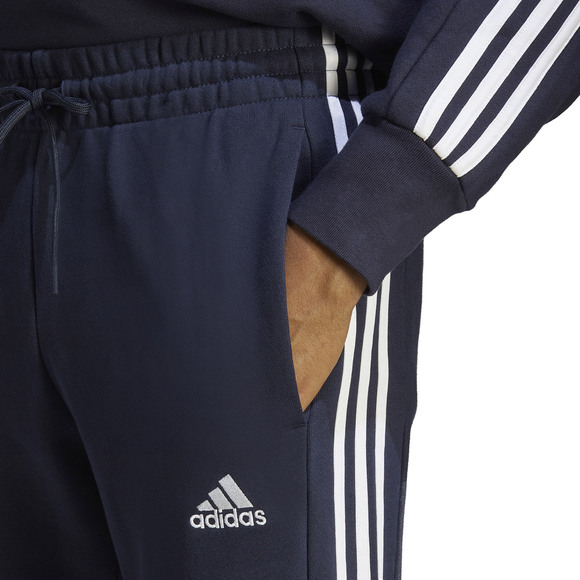 Spodnie męskie adidas Essentials French Terry Tapered Cuff 3-Stripes granatowe IC9406