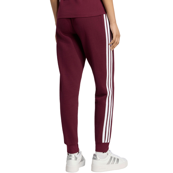 Spodnie damskie adidas Essentials 3-Stripes Fleece Slim bordowe KF8321