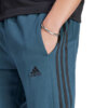 Spodnie męskie adidas Essentials French Terry Tapered Cuff 3-Stripes Pants niebieskie IJ8698